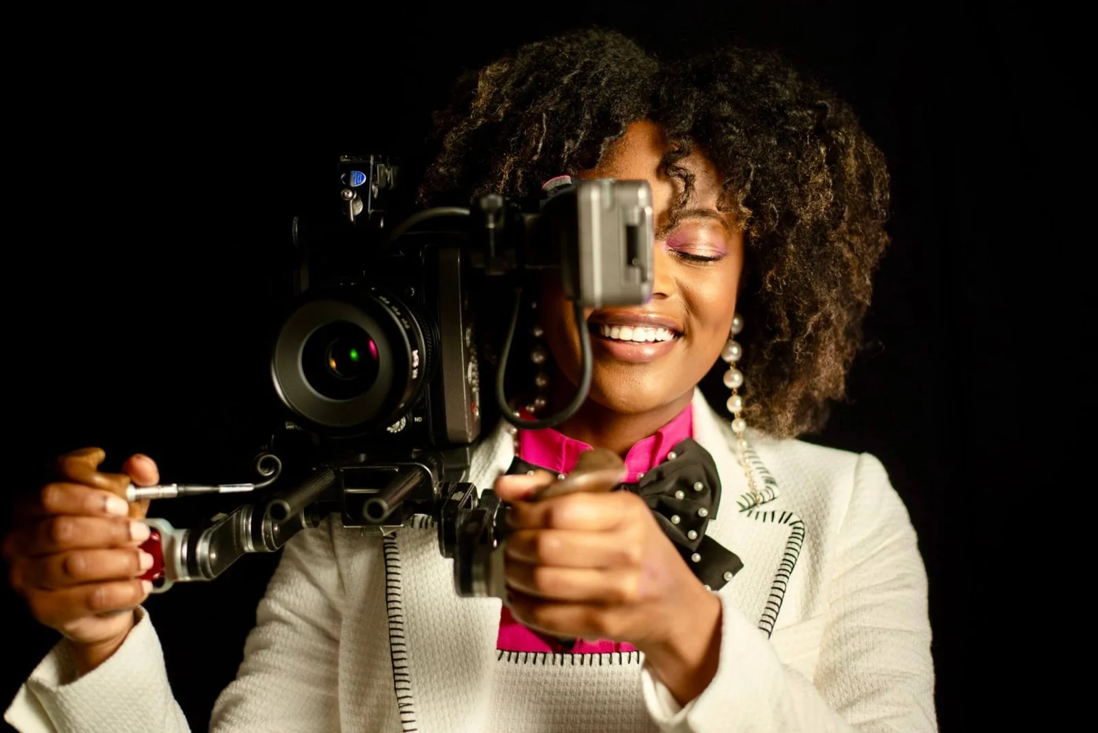 woman holding a camera